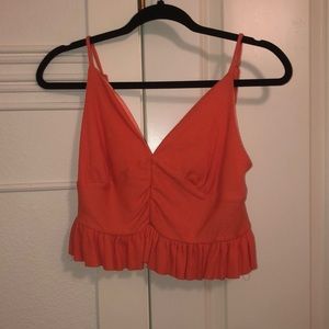 Orange tank top from a boutique. Size small